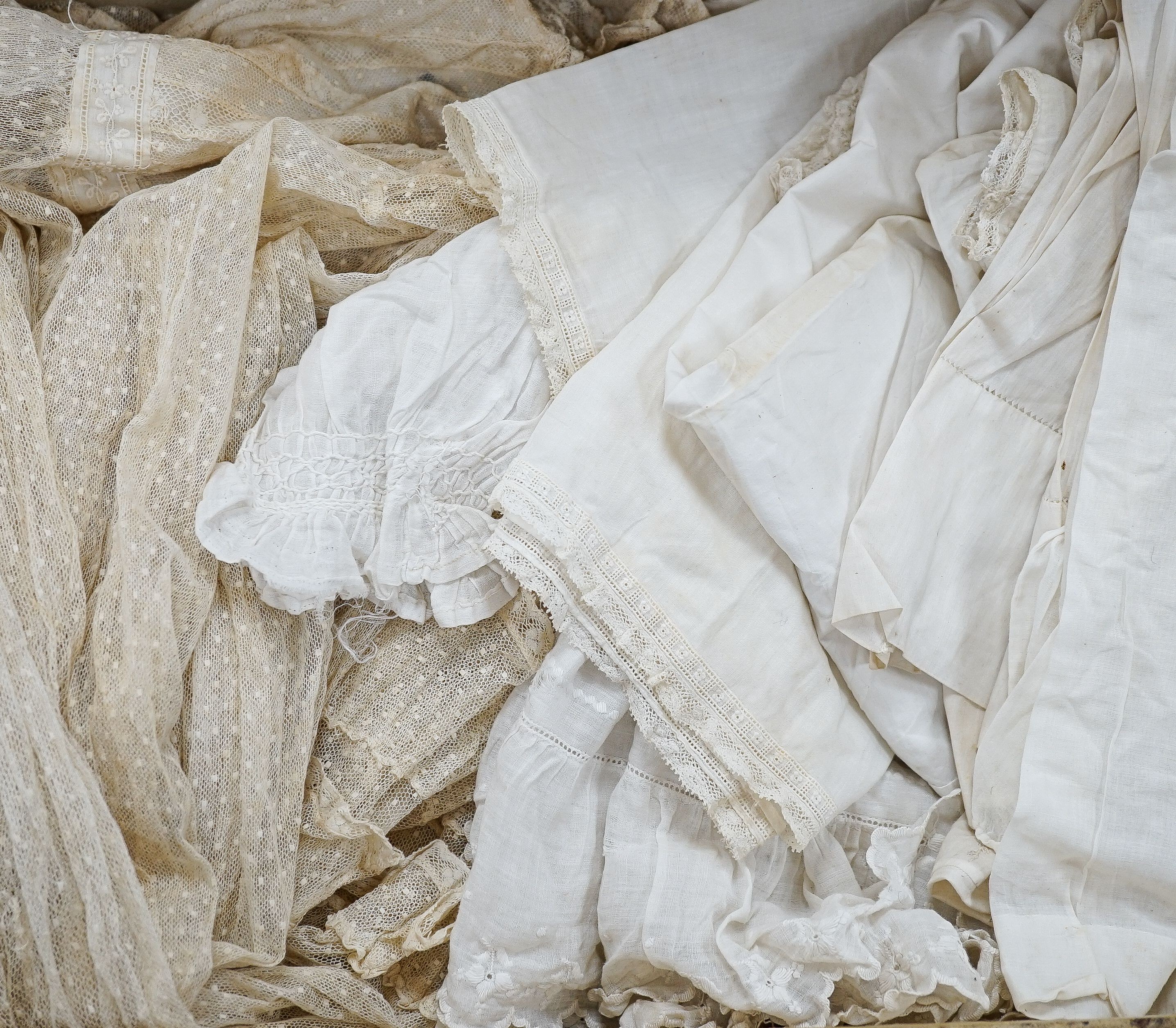 Various christening gowns, 2 dresses in a suitcase